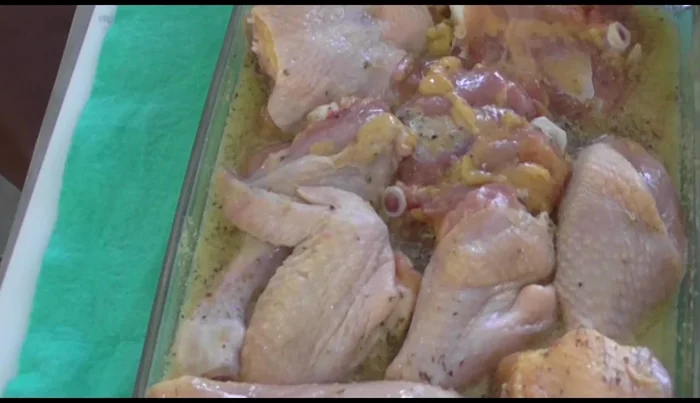 Bake the chicken in the oven at 200°C (approximately 400°F) for 1 hour and 30 minutes.