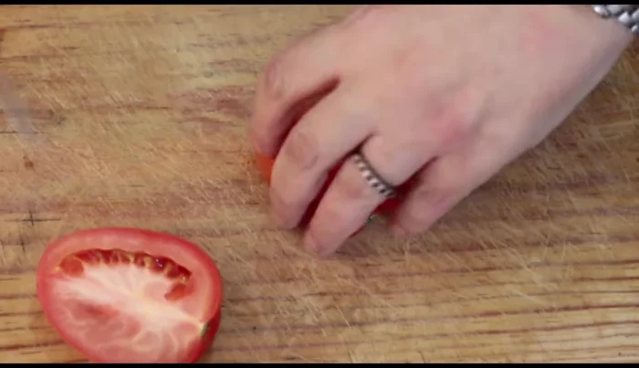 Chop vegetables: Dice tomatoes and onion into small pieces (139.239).
