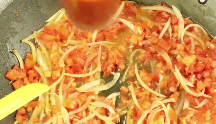 Stir in the tomato puree and cook for another 5 minutes.