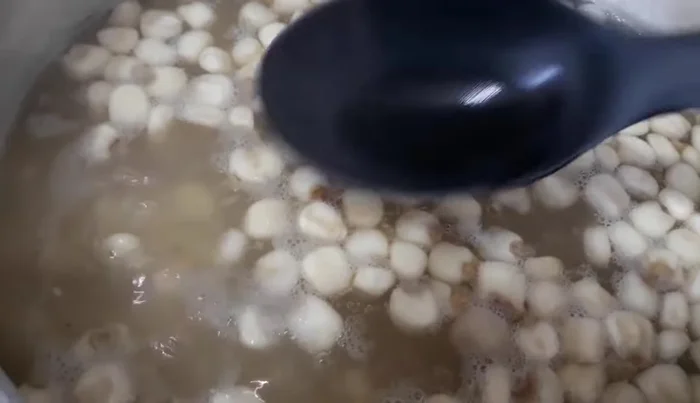 Once the corn is boiling (water will be cloudy), rinse under running water until the water runs clear. (230.439)