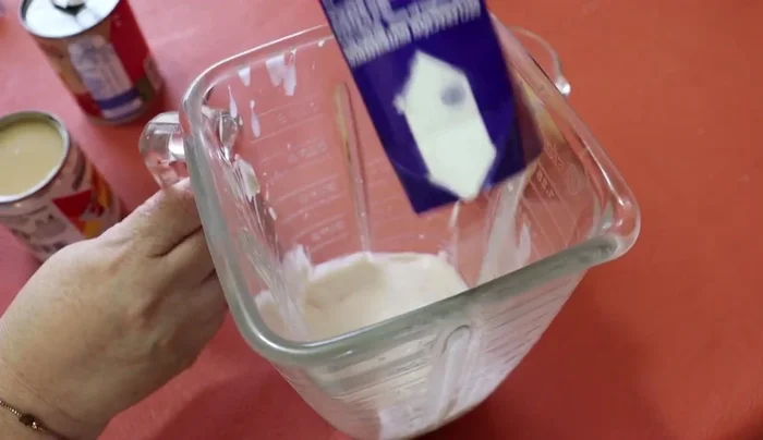 Blend half cream, evaporated milk, condensed milk, and the dissolved unflavored gelatin. Microwave for 40 seconds or use a double boiler until liquid. (150.06)