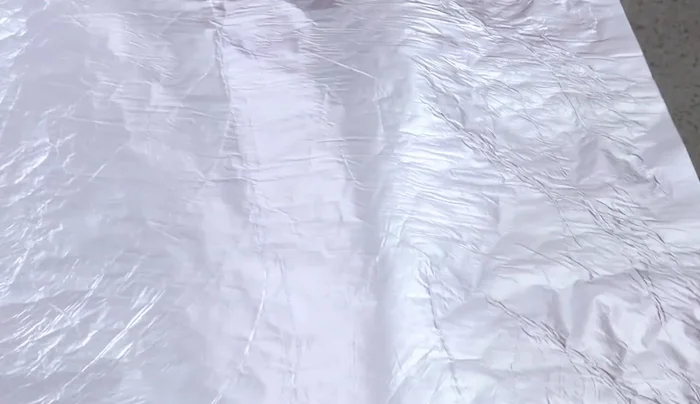 Cover the mold with aluminum foil.