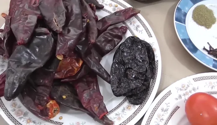 Prepare the marinade: remove stems from guajillo and ancho chiles. Boil chiles in water until hydrated.