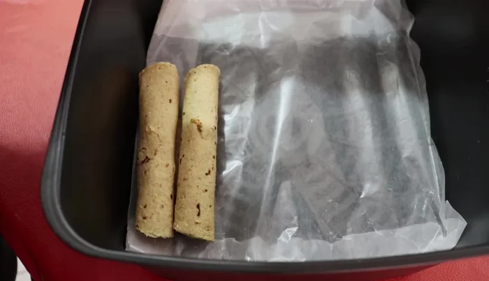 Line the air fryer basket with baking paper.