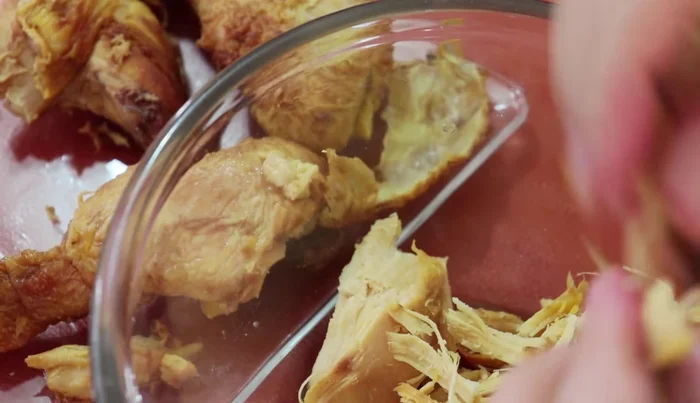 Shred the leftover roasted or boiled chicken.