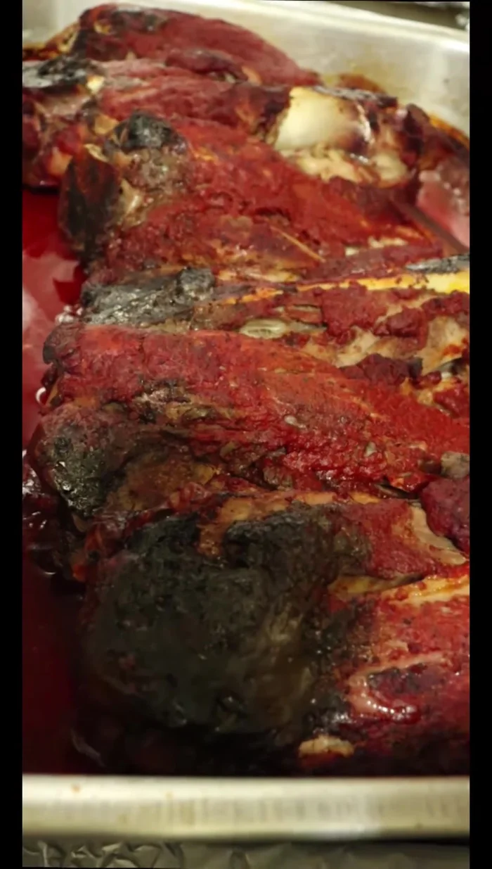 After 2 hours, flip the shanks, add remaining marinade on top and bake for another half an hour at 250 degrees.
