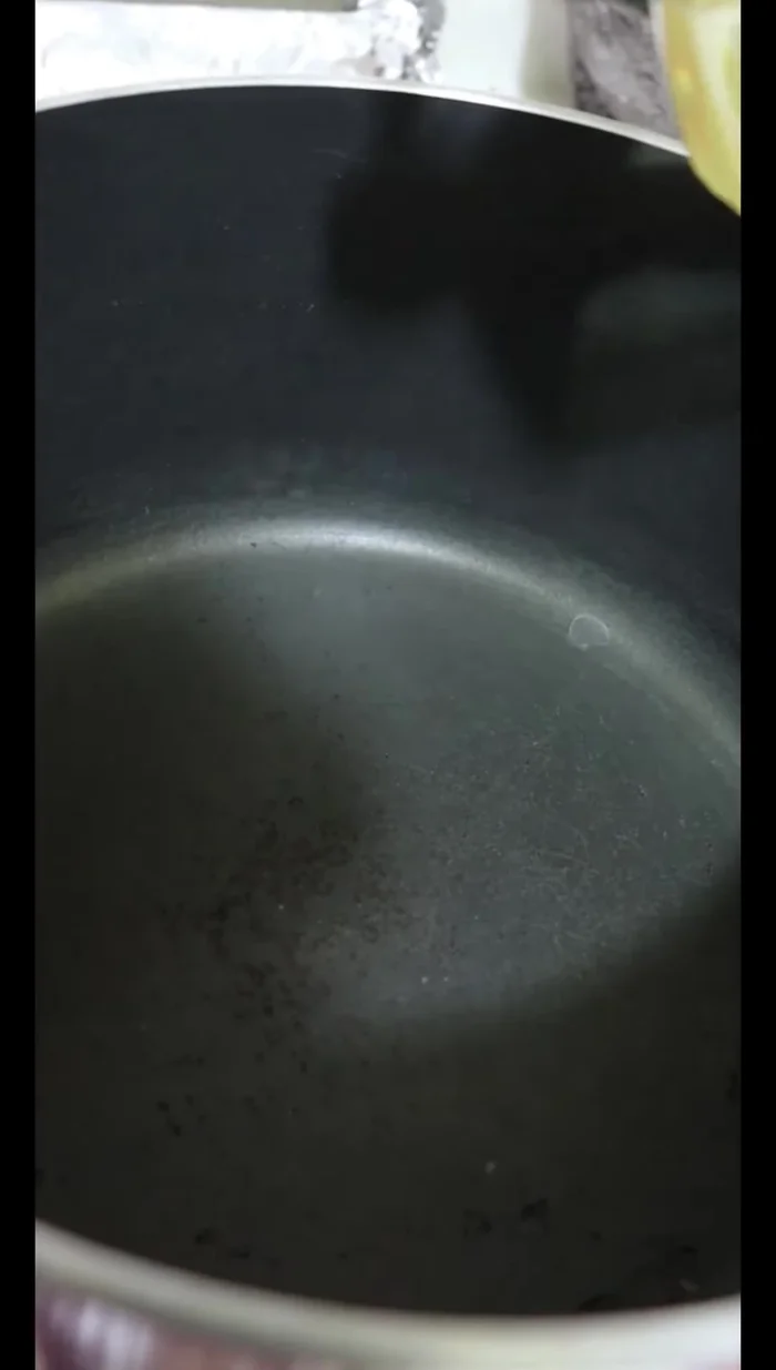Strain the marinade through a saucepan with a little oil.