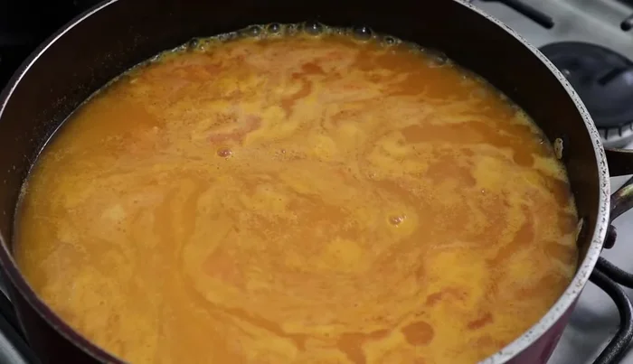 Add another cup of water and the frozen/canned/pre-cooked vegetables. Bring to a boil.