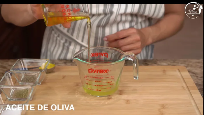 Prepare the dressing: Combine vinegar, olive oil, lemon juice, minced garlic, mustard, pepper, salt, and oregano. Taste and adjust seasoning.
