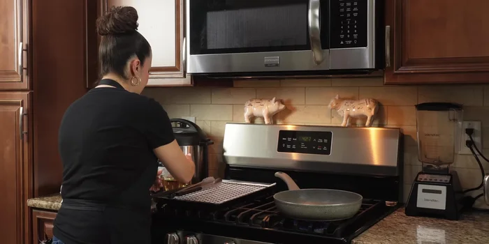 Heat oil in a pan on medium heat. Carefully fry the chimichangas until golden brown on both sides.