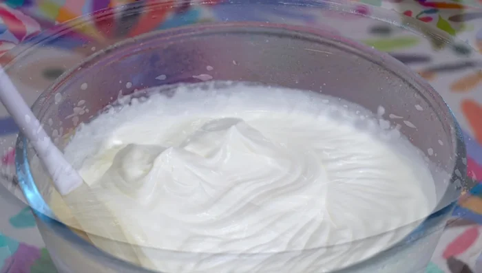 Gently fold half of the whipped cream into the lemon mixture.