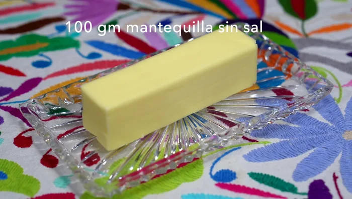 Melt the butter in the microwave for 30 seconds. Add it to the cookie mixture and mix well.
