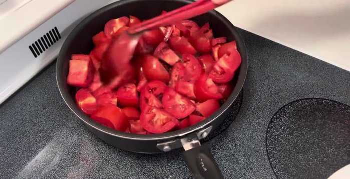 Add tomatoes, increase heat slightly, and cook for about 5 minutes, stirring occasionally.