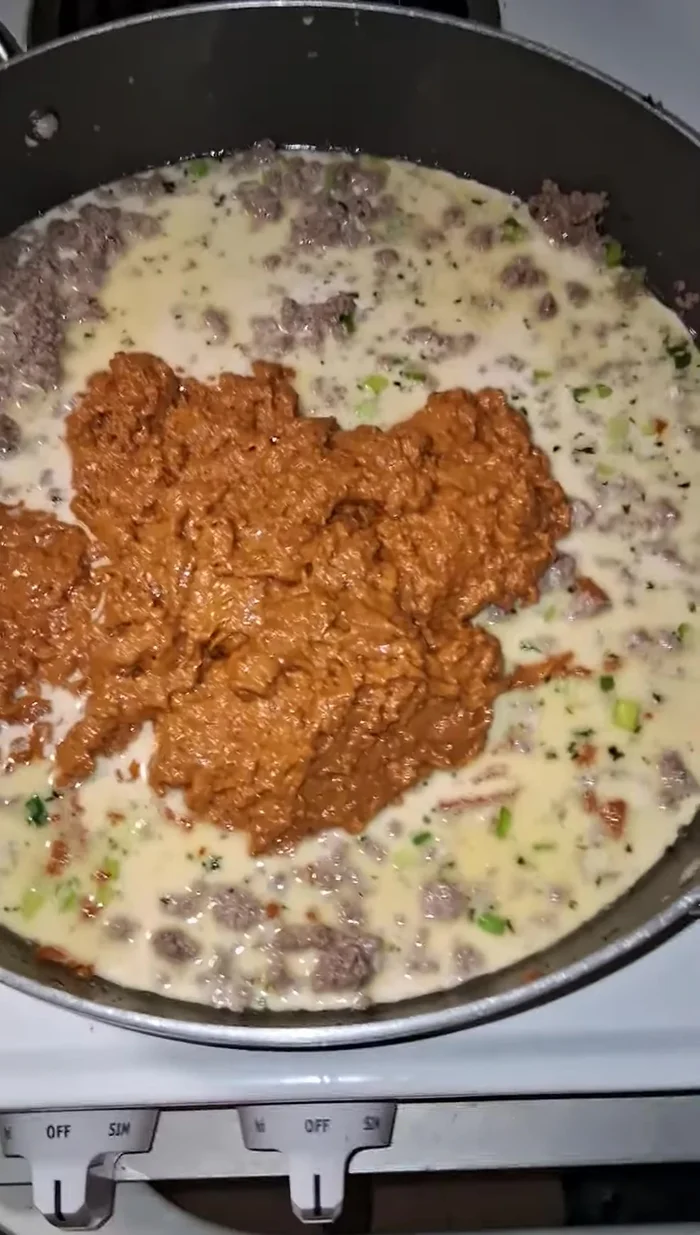 Stir in cheese until melted.