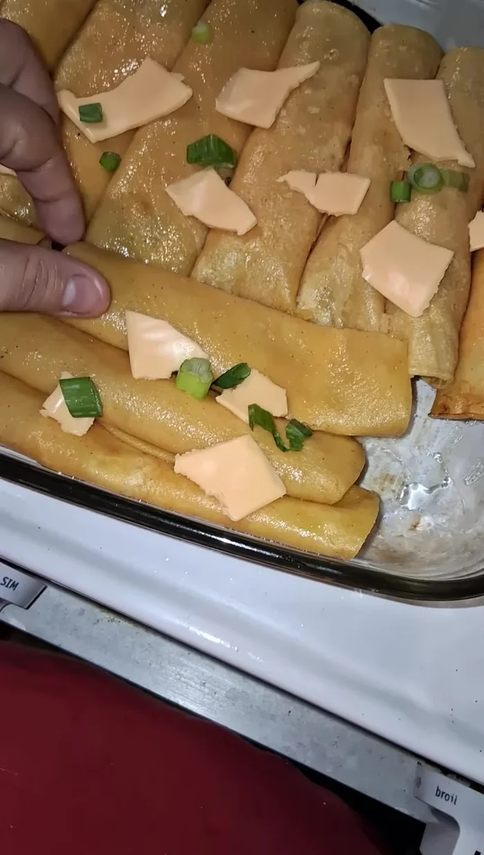 Prepare filling: Brown ground beef, adding green onions, parsley, black pepper, and seasonings. Cook until no liquid remains.
