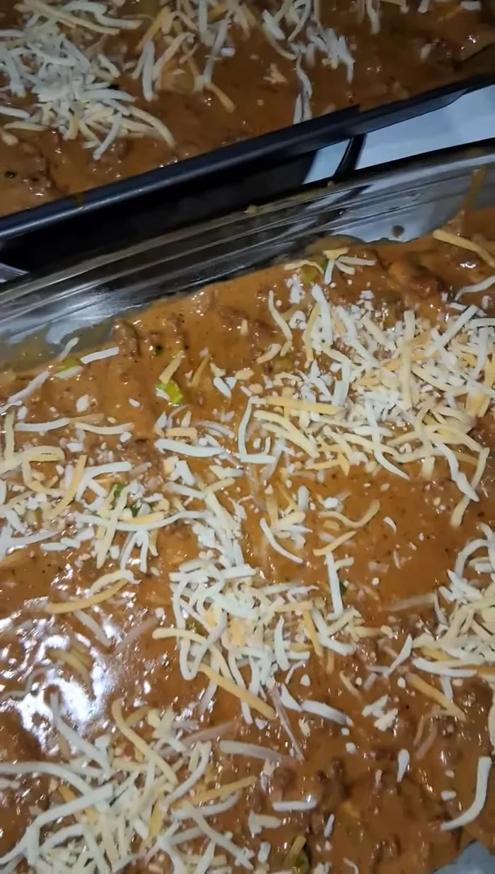Top with extra cheese and green onions.