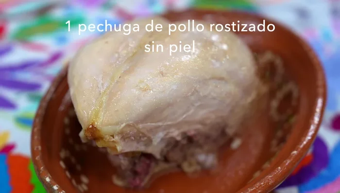 Prepare the chicken: Cut the skinless roasted chicken breast into small pieces.