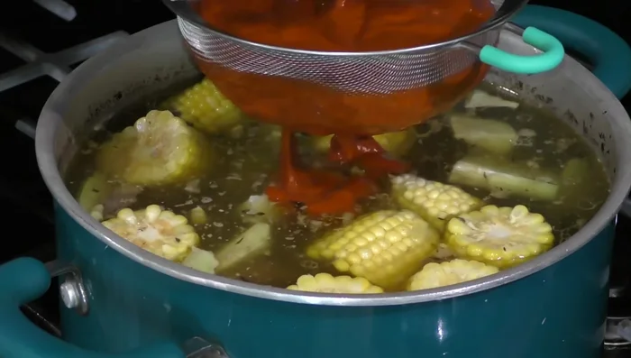 Strain the sauce through a sieve.
