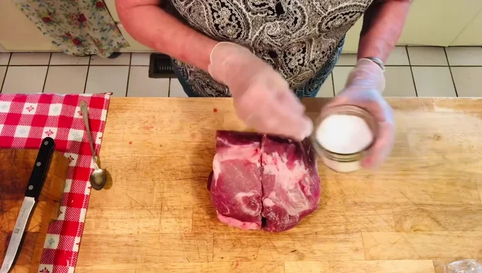 Generously salt the pork roast. Roast the pork roast until cooked through.
