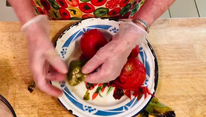 Remove stems and seeds from the chilies and tomatoes (leave some seeds for extra heat, if desired).