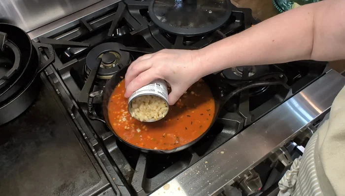 Add the drained corn to the top of the mixture.