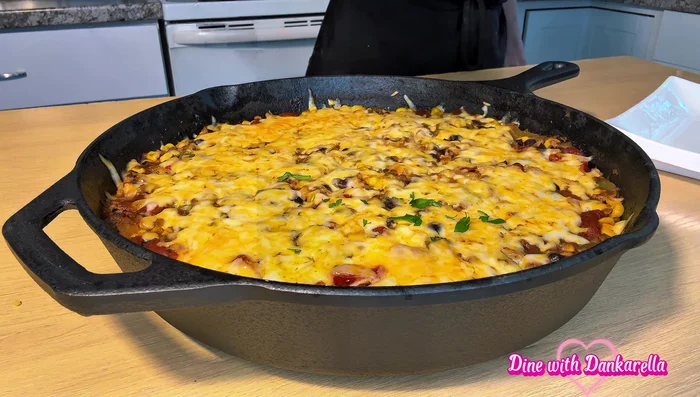 Remove from oven, top with grated cheese (Kobe Jack suggested, or your preferred cheese).