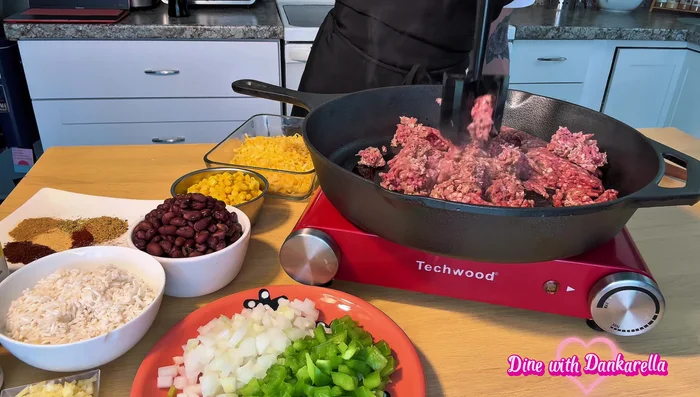 Heat 1 tablespoon of olive oil in a cast iron skillet (or any skillet). Add 1 pound of ground beef and break it up.
