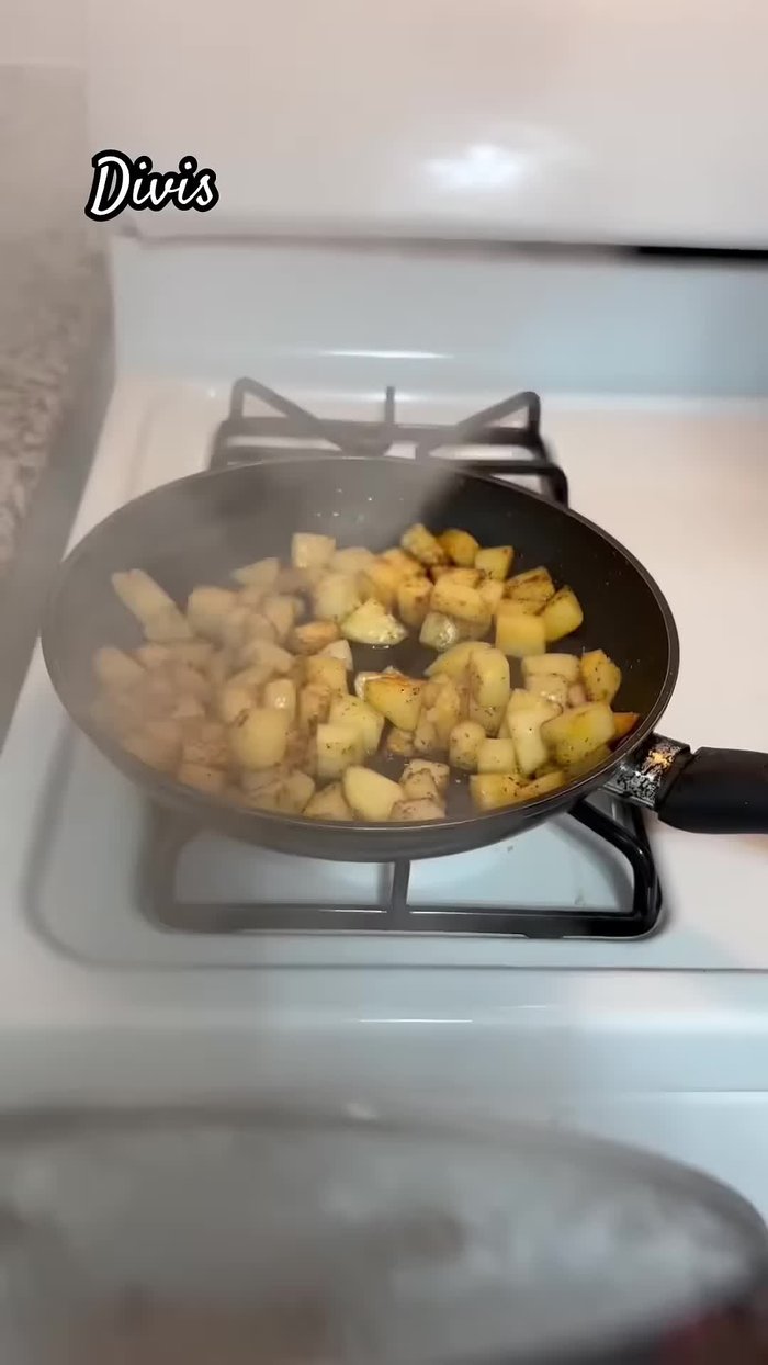 Cover the pot and cook the potatoes over low heat until soft.
