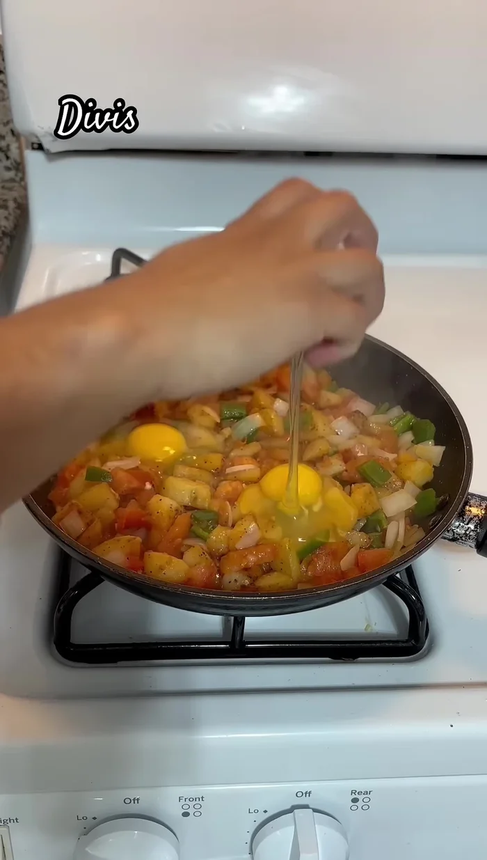 Add four eggs, stir gently, and let it cook for a while.
