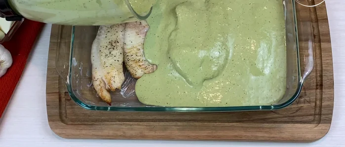 Pour the blended sauce over the fish, completely covering them. Cover with aluminum foil and bake at 350°F (177°C) for 20 minutes.