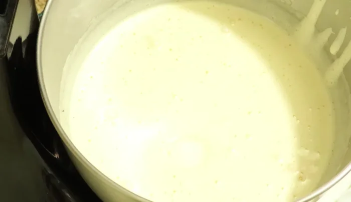 Add vanilla and butter: Add 2 tablespoons of vanilla extract and the softened butter (or margarine/oil). Beat for 3 more minutes.