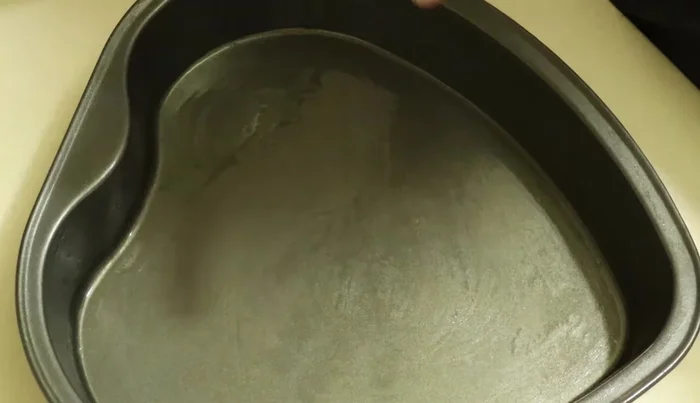Prepare the cake molds: Grease and flour two heart-shaped cake molds. Line with parchment paper.