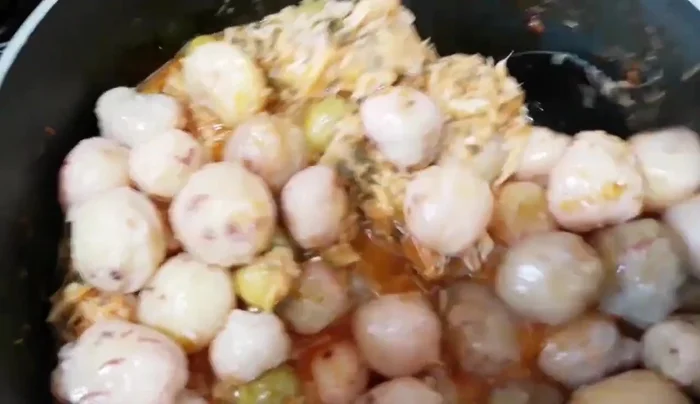 Add the cooked potatoes and stir to combine. Adjust seasoning with salt as needed. Continue to cook for 15 minutes.