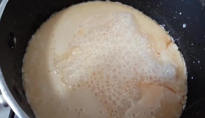 Combine milks and gelatins: Add the evaporated milk, half-and-half cream, and condensed milk to the peach gelatin mixture. Stir well to combine. (199.5)