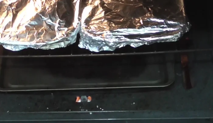 Bake the chicken in a preheated oven at 180°C (356°F) for 1 hour. (256.88)
