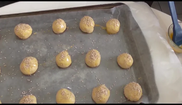 Preheat oven to 200°C (400°F), then reduce to 180°C (350°F). Bake for 15-20 minutes, or until golden brown.