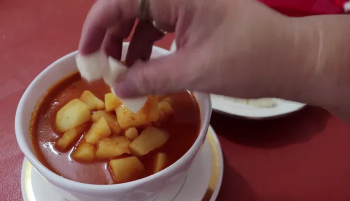 Serve hot. Garnish with cheese (optional).