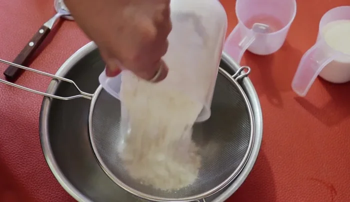Sift flour and baking powder into a bowl.