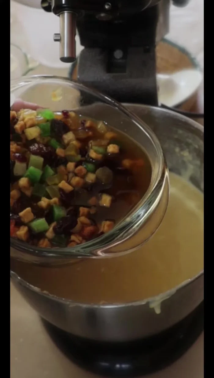 Gently fold in the soaked candied fruit. (258.239)