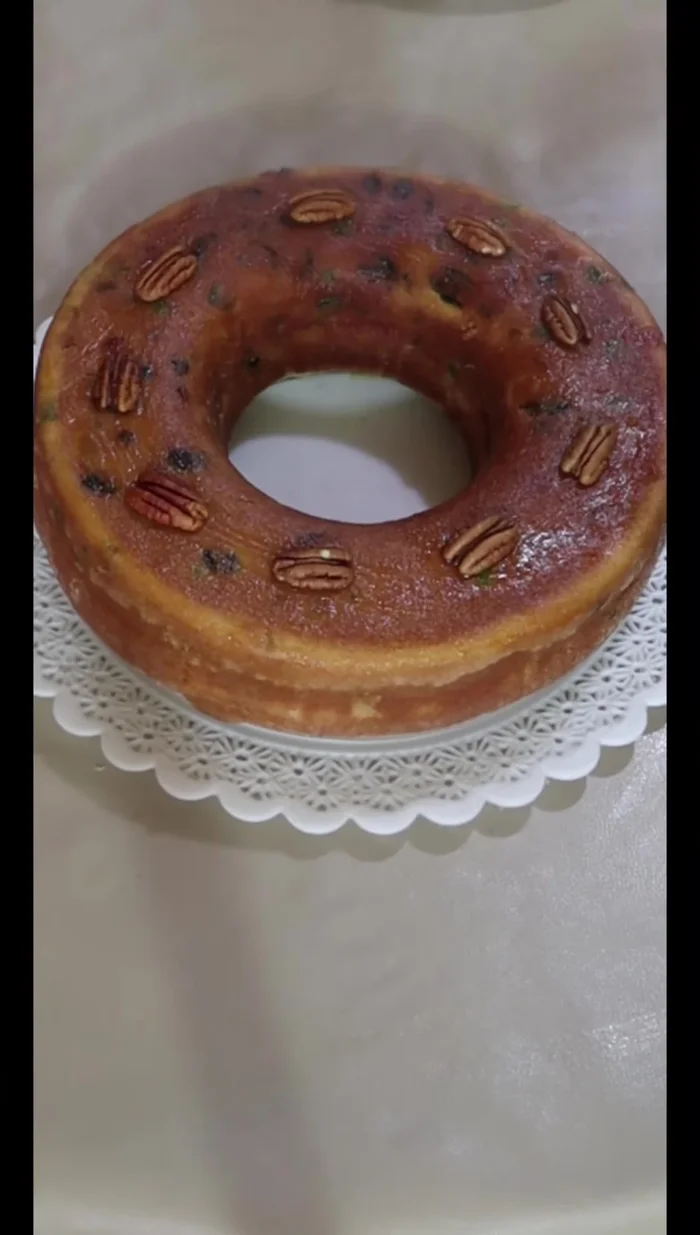 Garnish with nuts and cherries (optional). (415.879)