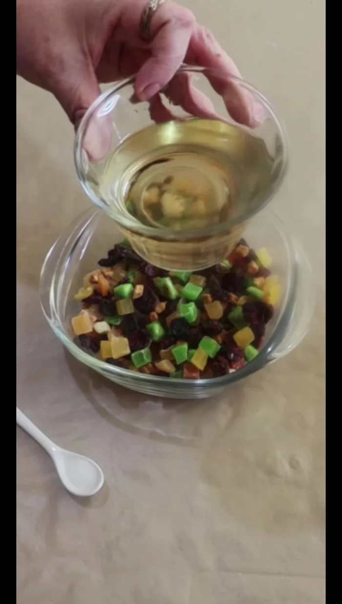 Soak candied fruit in tequila (or brandy/orange juice) for 4-5 hours or overnight. (62.92)