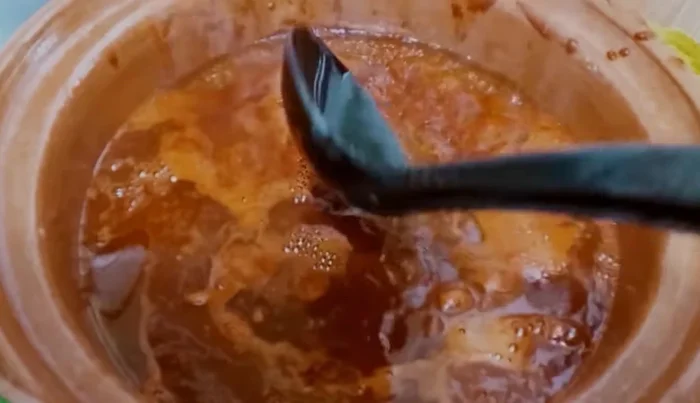 Add 2 tablespoons of vinegar to the strained mixture. Simmer and season with salt and granulated broth (optional). Let it simmer for approximately 30 minutes until thickened.