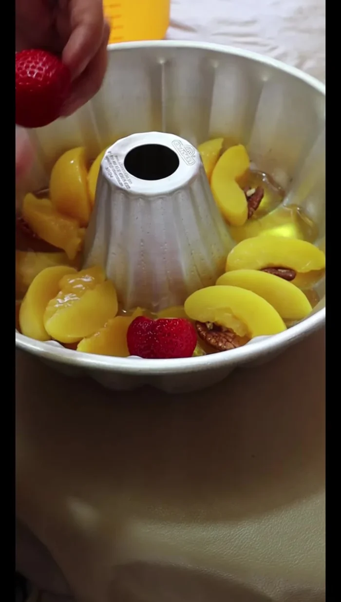 Add strawberries: Arrange strawberries on top, facing outward.