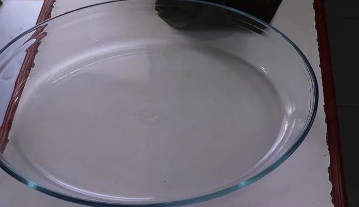 Place a banana leaf in a baking dish.