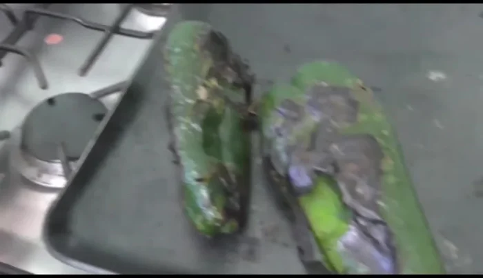 Peel the roasted peppers, remove the seeds and veins.