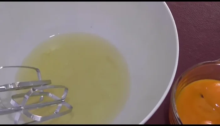 Beat egg whites until stiff peaks form, then gently fold in the egg yolks.
