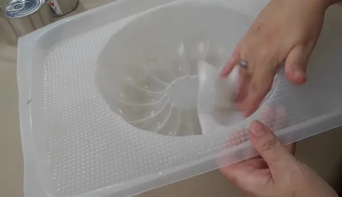 Chill the greased mold in the freezer for at least 5 minutes.