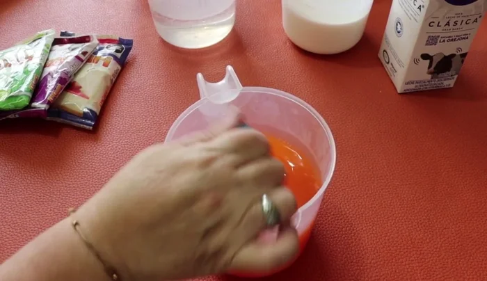 Let each gelatin rest for 5-10 minutes, then stir again. Repeat for all four gelatin flavors.