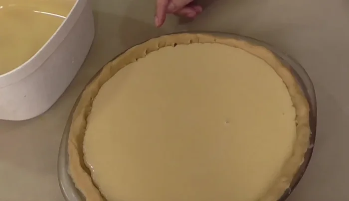 Bake the pie at 180°C (350°F) for about an hour. Let it cool slightly before removing from oven.