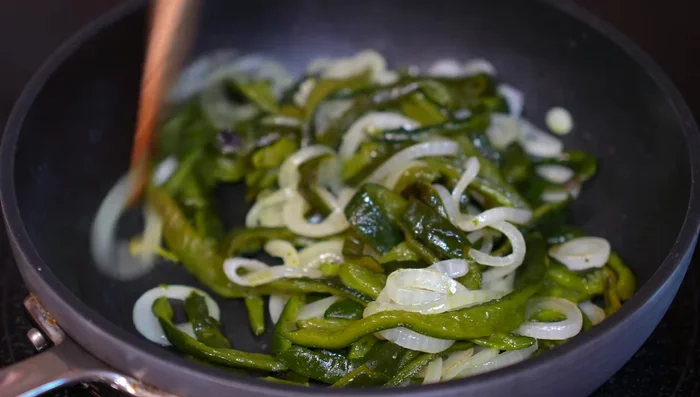 Remove pepper and onion mixture to cool.